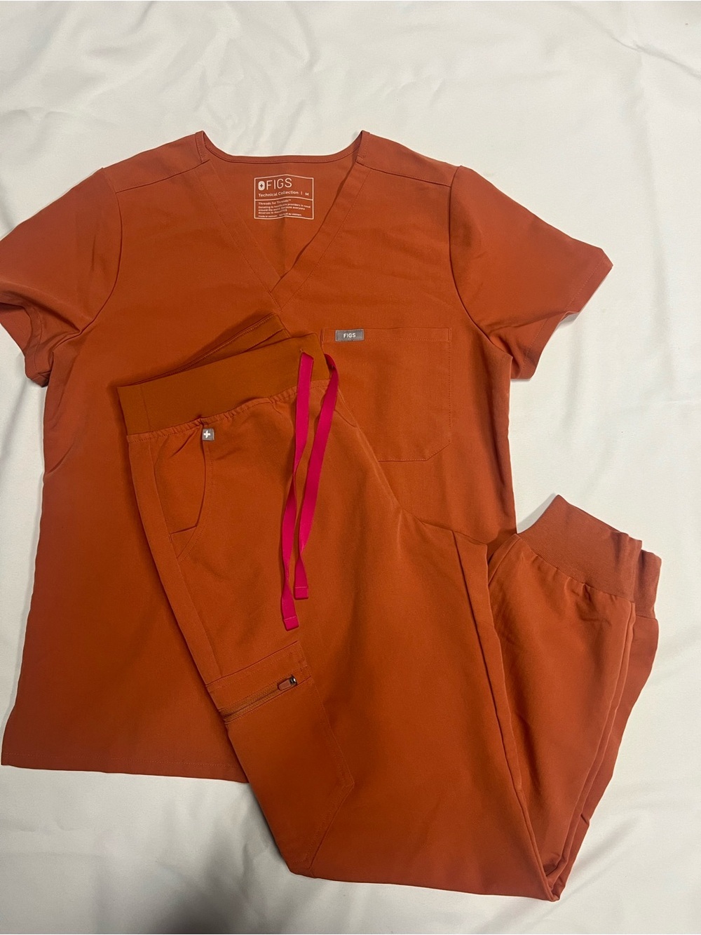 FIGS Women's V-Neck Scrub Top in Rust Orange